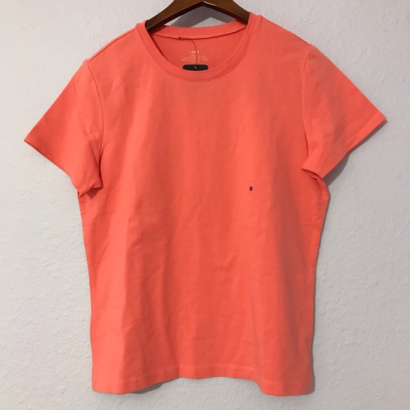 salmon colored shirt
